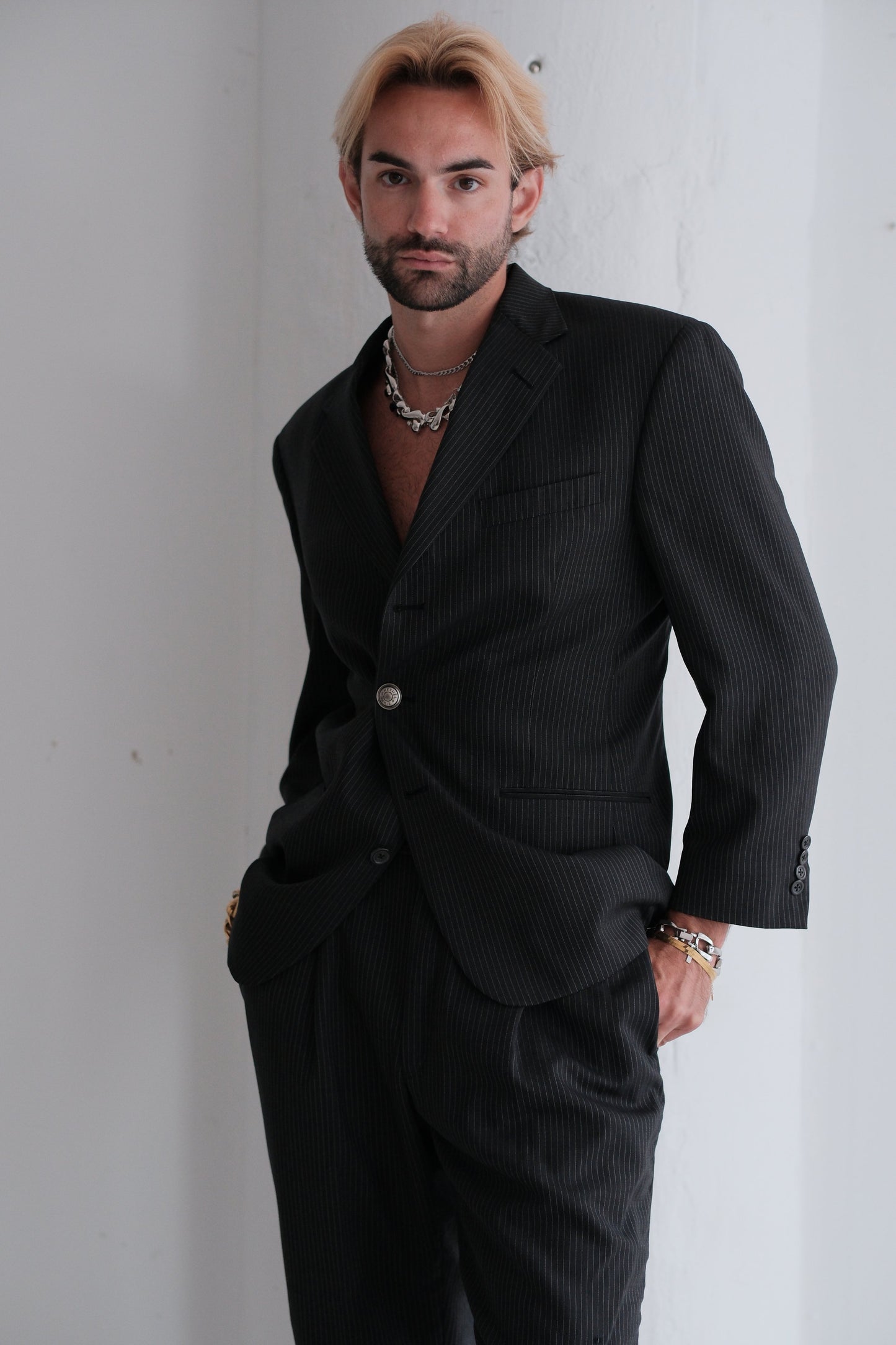 Pinstripe suit with vintage Hermes buttons
